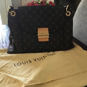 Louis Vuitton handbag w/bag